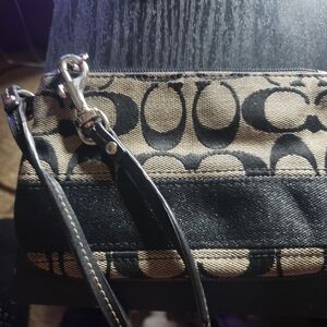 Coach Black and Tan Women's Wristlet.